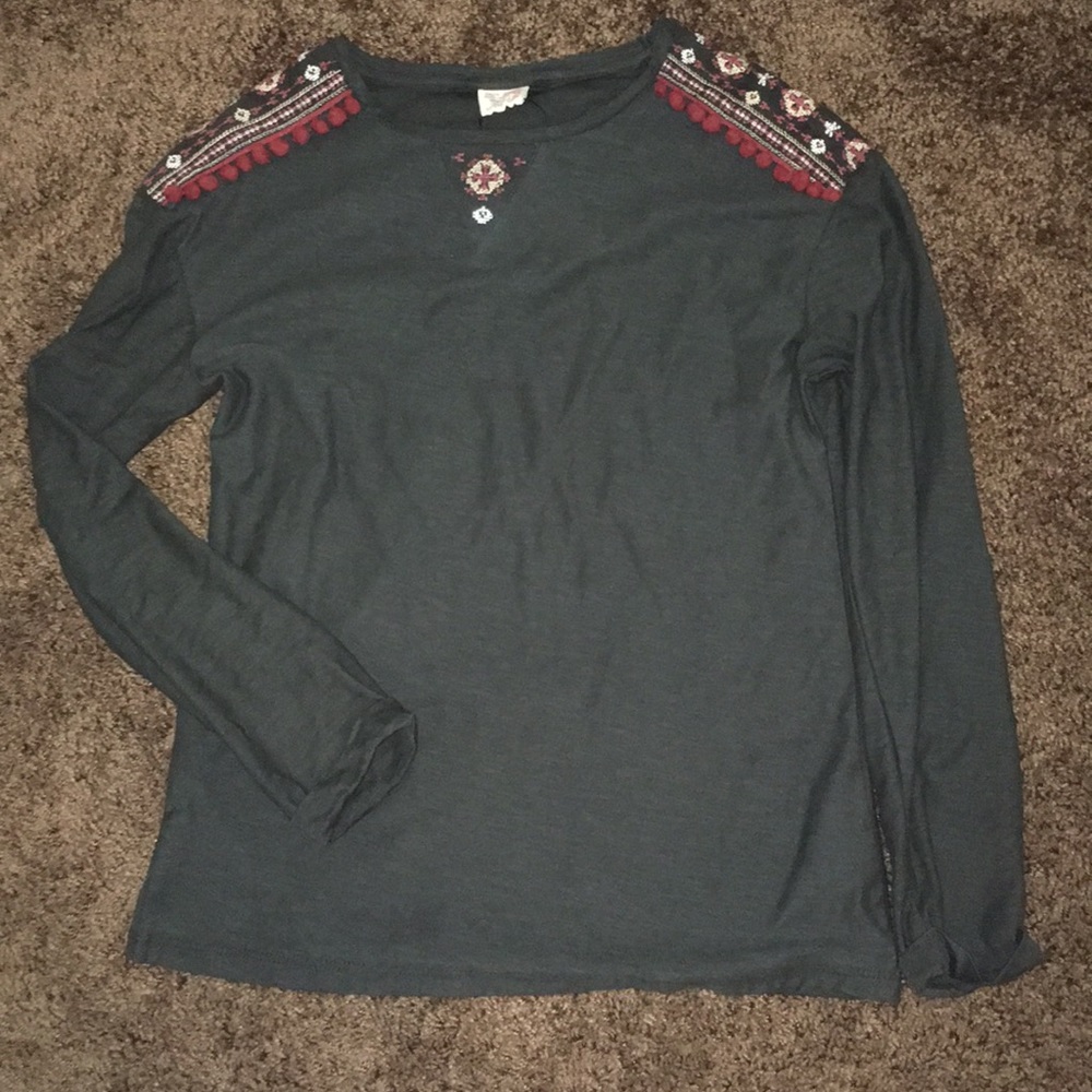 Dark grey shirt with Pom poms